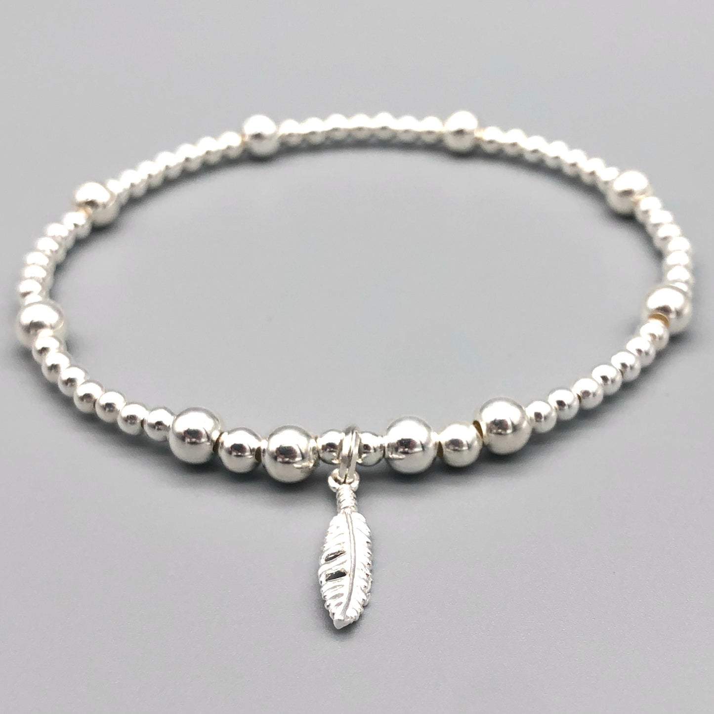Feather charm girl's 925 sterling silver stacking bracelet by My Silver Wish