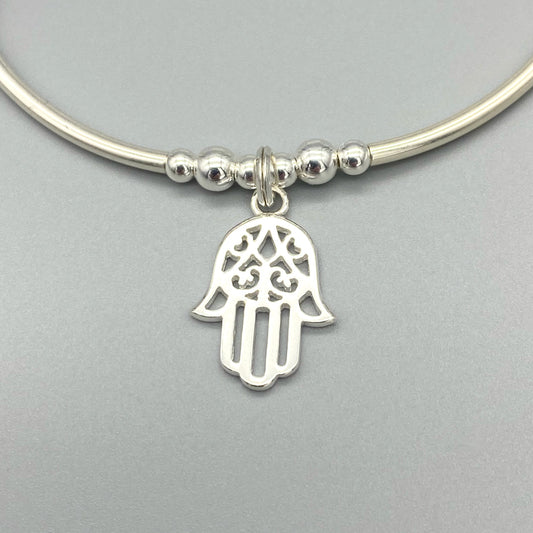 Closeup of Hamsa hand charm chakra crystal sterling silver stacking bracelet for her by My Silver Wish