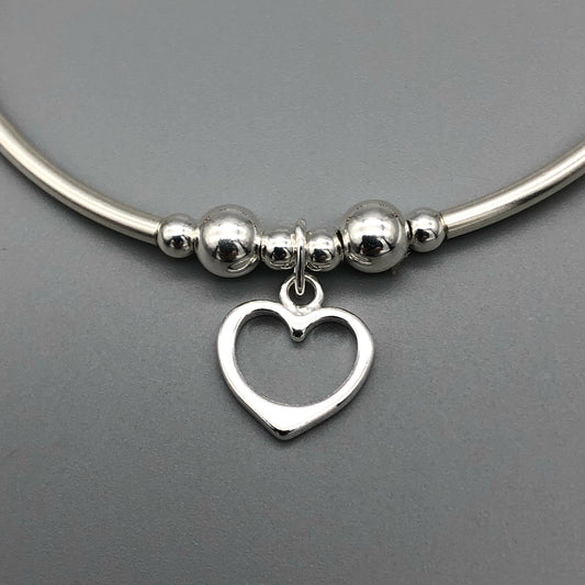 Closeup of Heart Charm Rainbow Crystals Sterling Silver Women's Stacking Bracelet by My Silver Wish