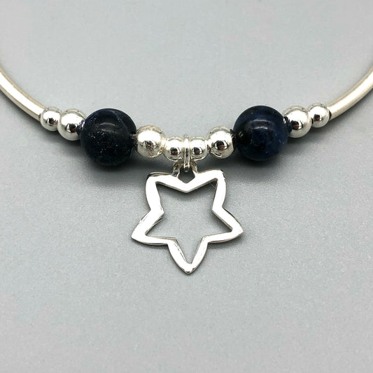 Closeup of Star charm sodalite healing stone & sterling silver beads women's stacking bracelet by My Silver Wish