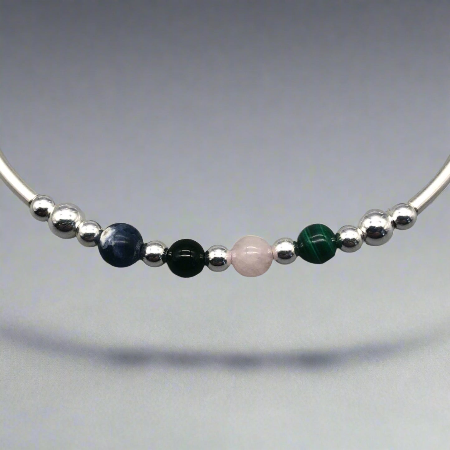 Closeup of Anxiety support healing crystal sterling silver women's stacking charm bracelet by My Silver Wish