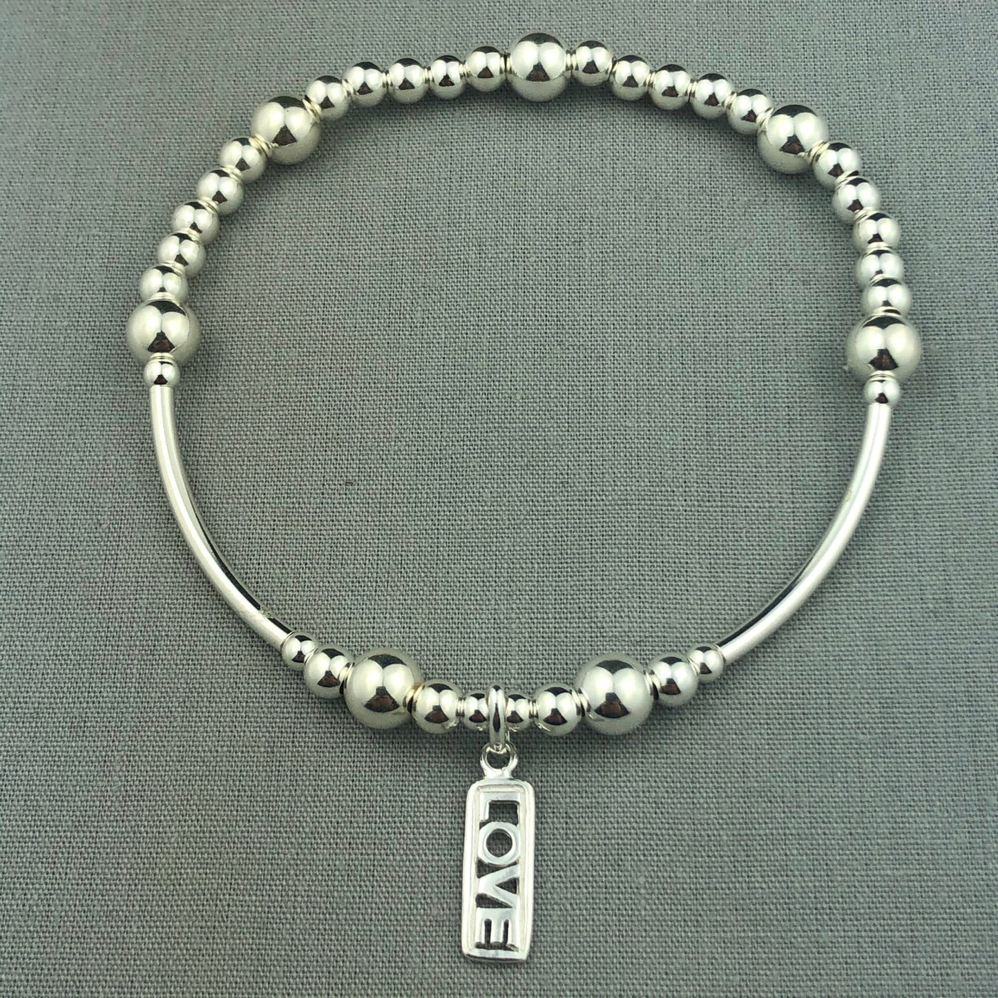 "Love" tag charm sterling silver stacking charm bracelet by My Silver Wish