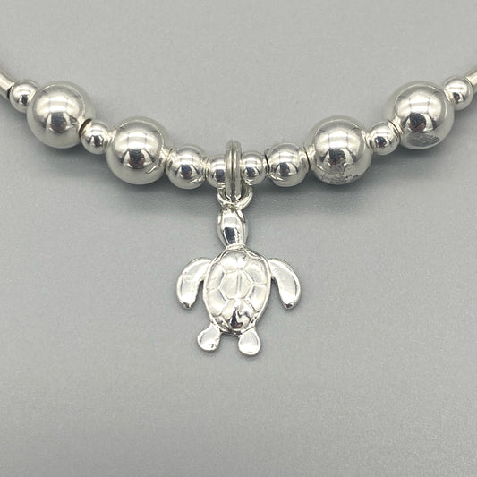 Closeup of Sea Turtle Charm Sterling Silver Women's Stacking Bracelet by My Silver Wish