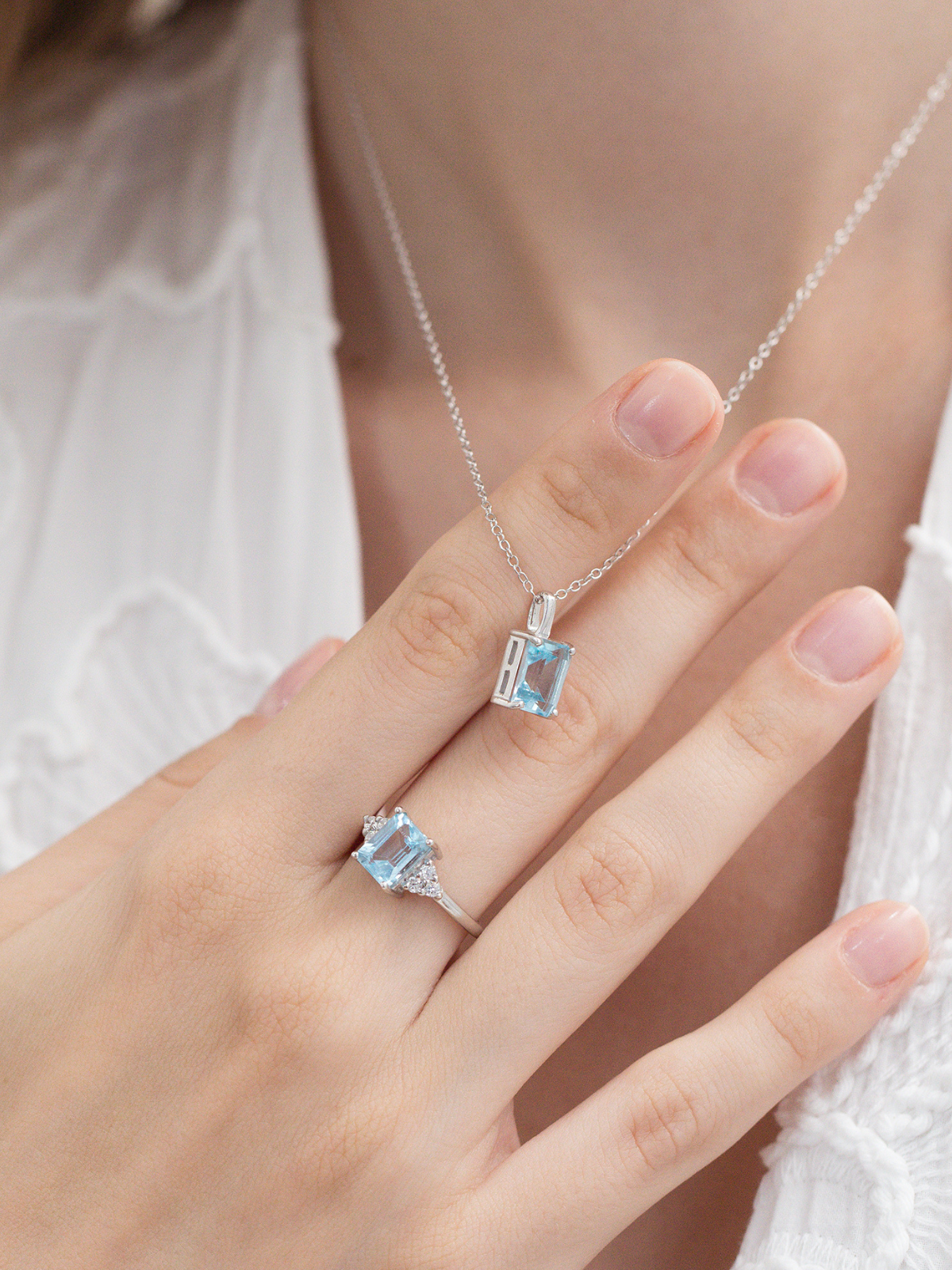 Blue Topaz Emerald Cut Pendant Necklace in Sterling Silver