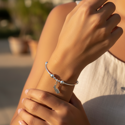 Model wearing a Rabbit Charm Women's Sterling Silver Stacking Bracelet by My Silver Wish