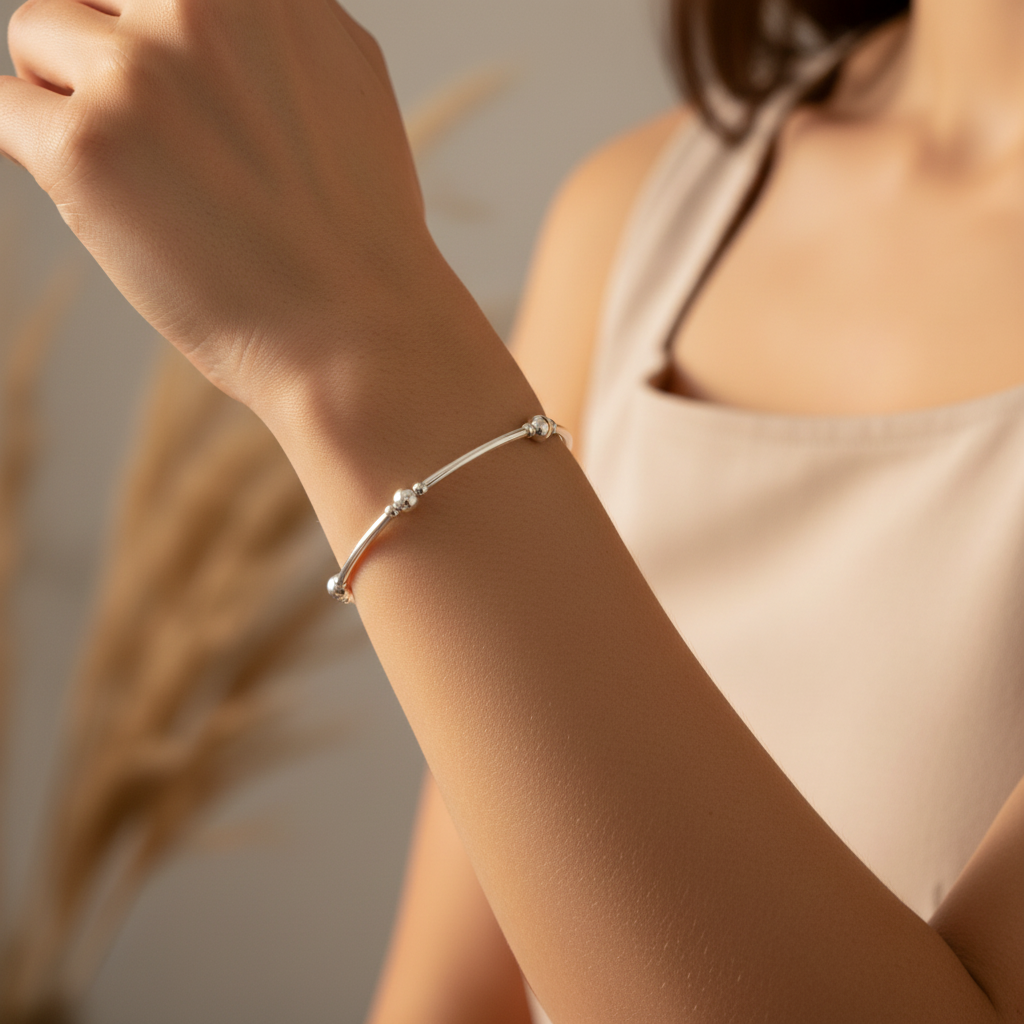 Woman wearing a Stack filler sterling silver hand-made women's stacking bracelet by My Silver Wish