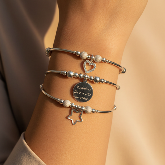 Model wearing a "Mother's Love is like no other" Sterling Silver Women's Charm Stacking Bracelet Set