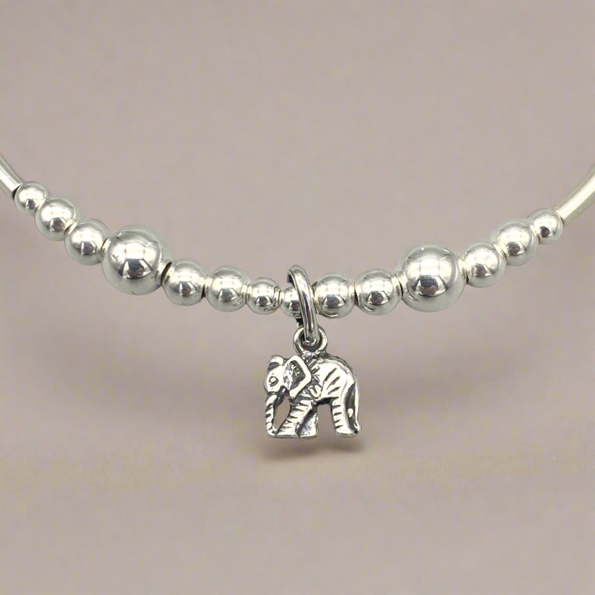 Closeup of Elephant charm sterling silver women's stacking bracelet by My Silver Wish