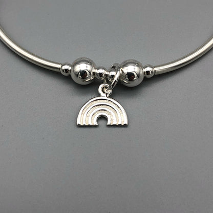 Closeup of Rainbow Women's Sterling Silver Stacking Charm Bracelet by My Silver Wish