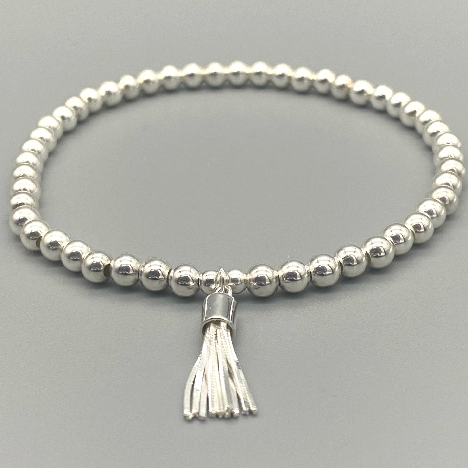 Tassel charm sterling silver women's beaded stacking bracelet by My Silver Wish